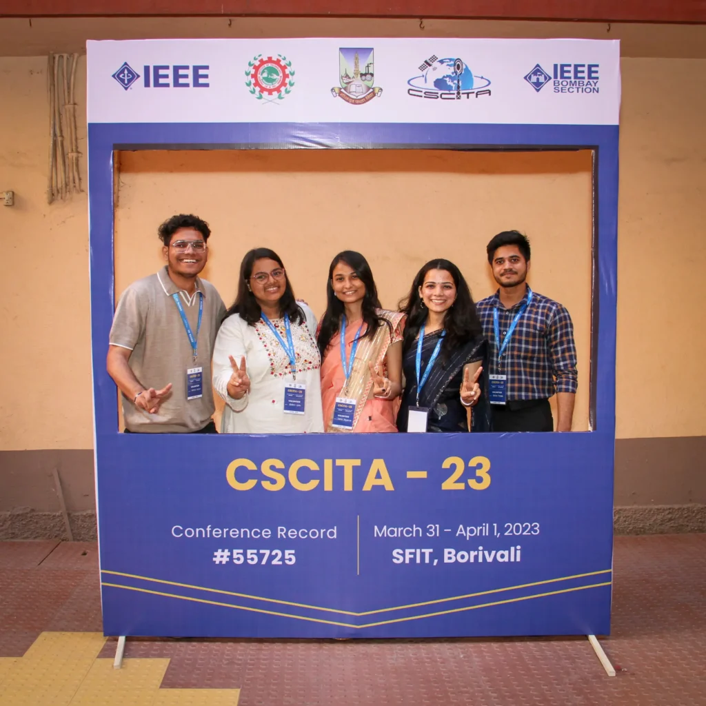 Attendees getting clicked at international conference, CSCITA 23 photo booth at St. Francis Institute of Technology.