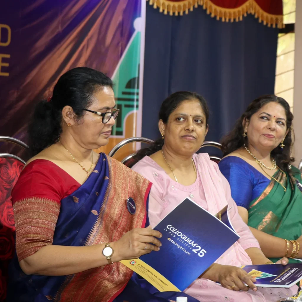 St. Francis Institute of Technology (SFIT) principal reading Colloquium 2025 proceedings on stage.