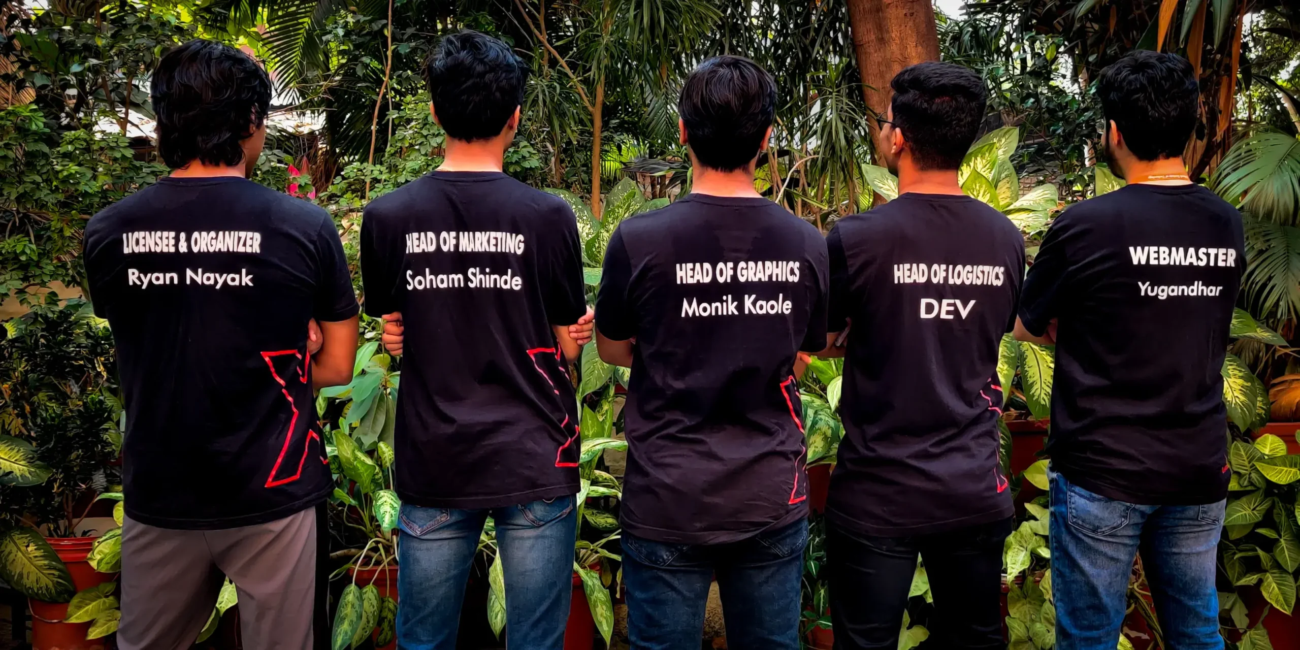 Team of TEDxSFIT getting clicked with their t-shirts designed by EvolvEd.
